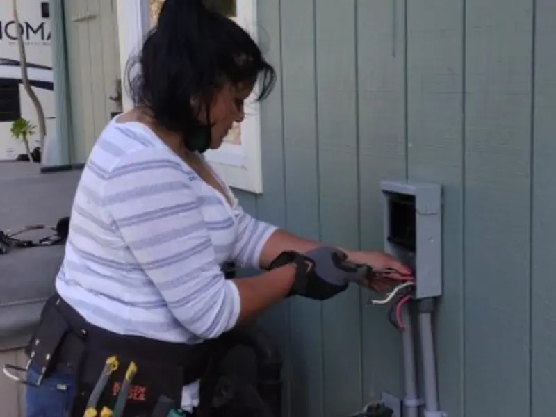 Licensed electrician wiring an exterior subpanel in Birch Bay