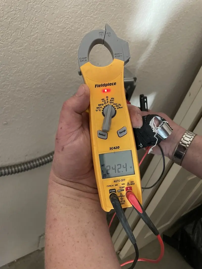 Voltage testing with clamp meter during Generator Installation in Birch Bay